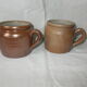 Set of 2 small stoneware pots with handle.