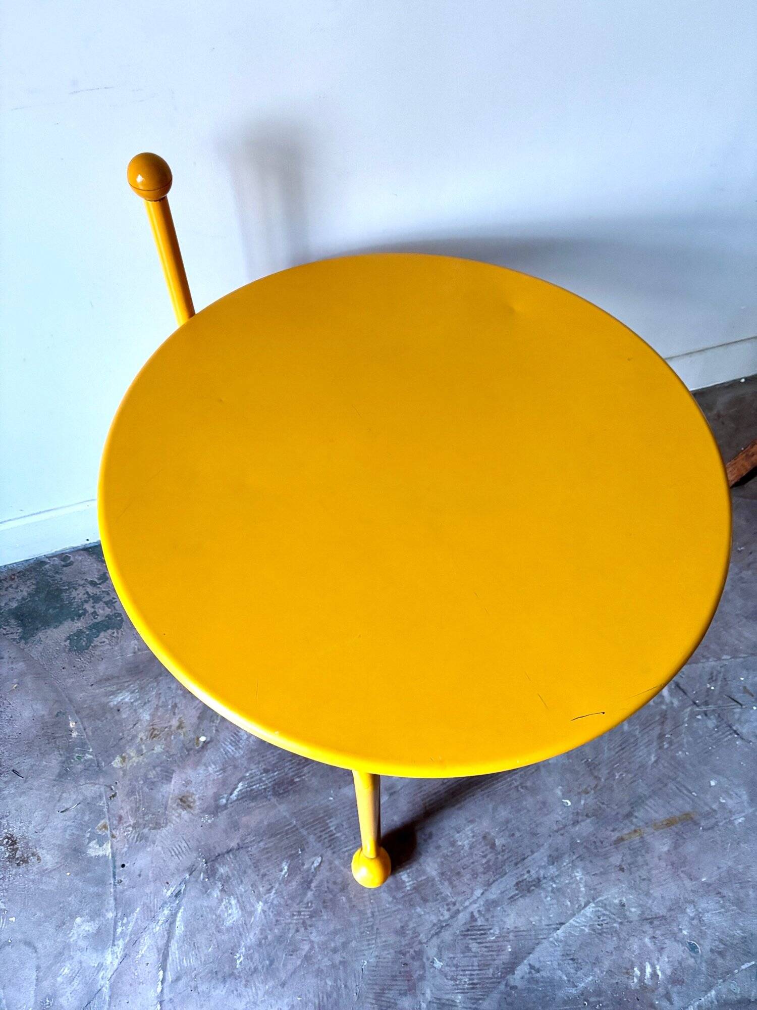 Yellow metal tripod coffee table by Tord Bjorklund for Ikea, circa 1980