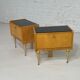 Pair of bedside tables in wood, brass and black glass top