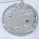 Chiseled glass basket cup on legs