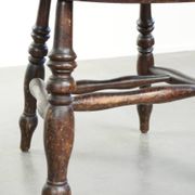 Wooden English antique pub/captain chair from the late 19th century