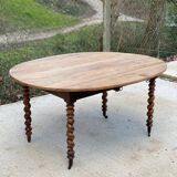 Table ovale à volets Louis Philippe XIXéme bois massif chêne pied torsade