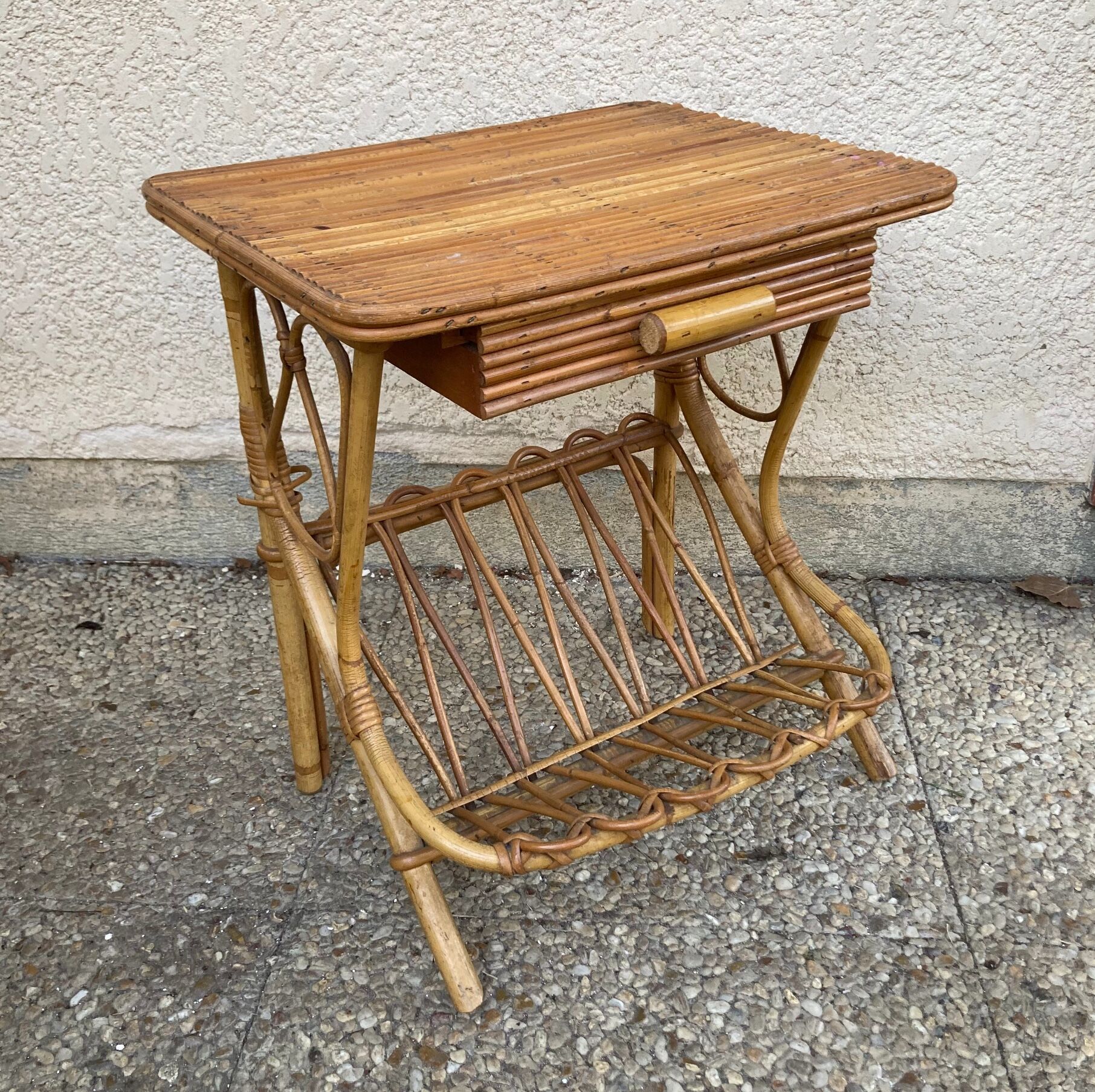 Vintage rattan magazine rack table