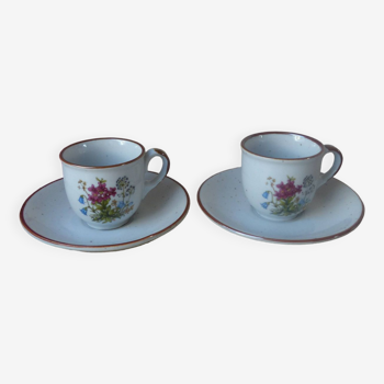 Set of two flowered stoneware cups and saucers from the 1980s