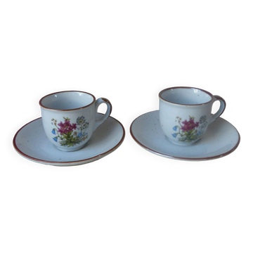 Set of two flowered stoneware cups with saucer from the 1980s.