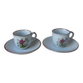Set of two flowered stoneware cups and saucers from the 1980s