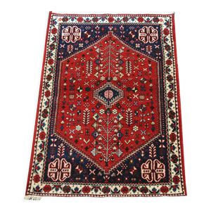 Tapis persan authentique milieu