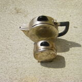 Set of a teapot and a silver metal sugar bowl