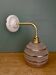Vintage pink and gold frosted glass globe wall light.
