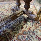 Rebirth table with oak dolphins