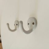 Antique enamelled cast iron wall hook from the 30s/40s