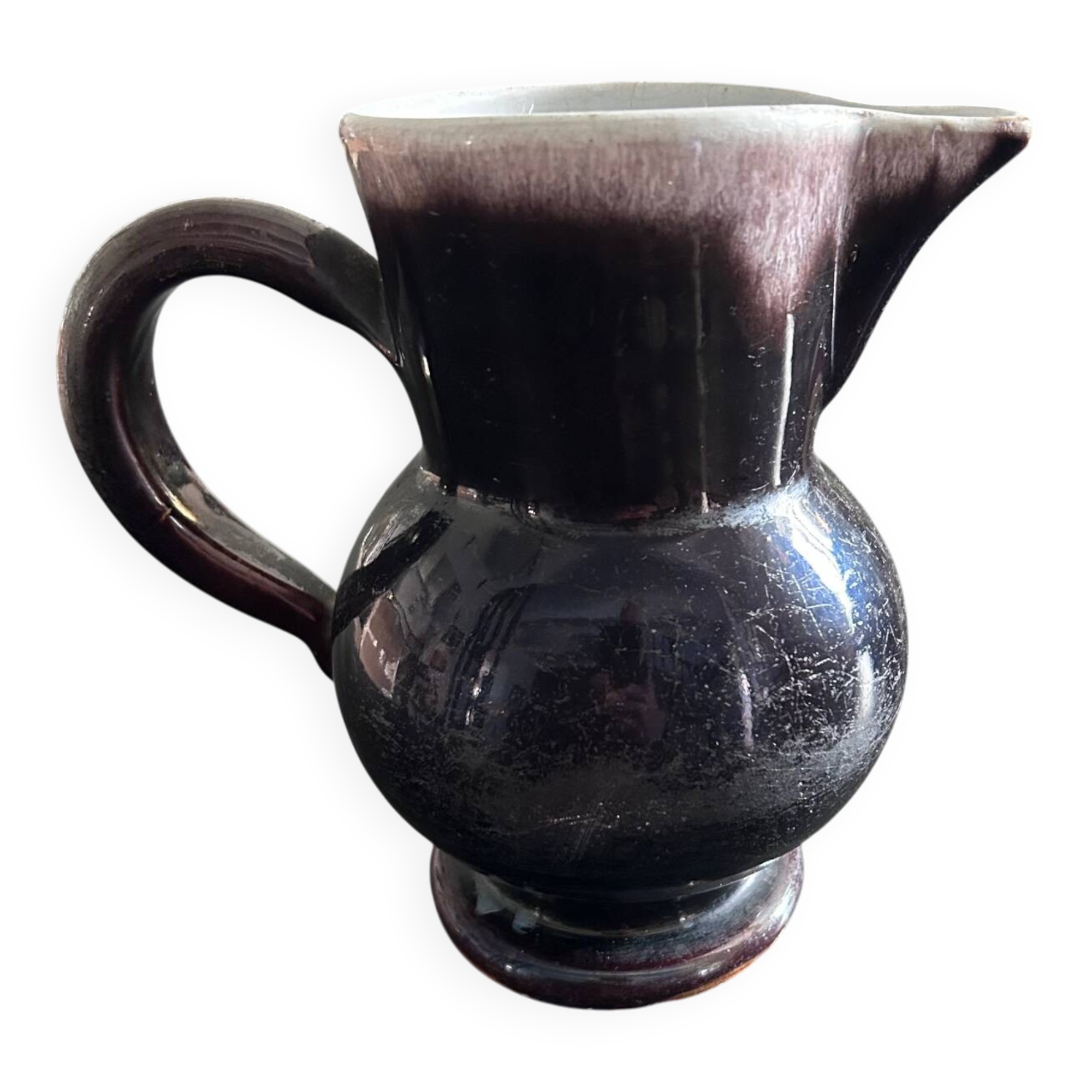 Antique tilted pitcher