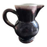 Antique tilted pitcher