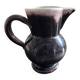 Antique tilted pitcher