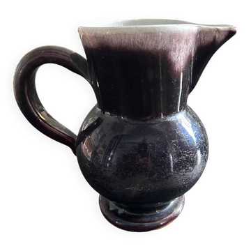 Antique tilted pitcher
