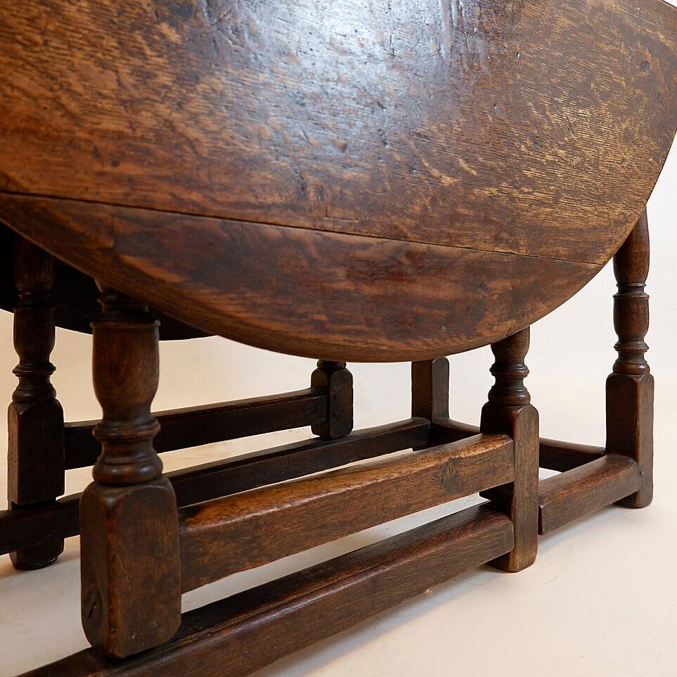 19th century English drop-leaf table with turned legs