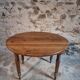 Antique drop-leaf table in French walnut – Oval table with folding extensions on both sides, late 19th century.