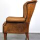 Sheepskin wingback chair with a unique design and a beautiful patina
