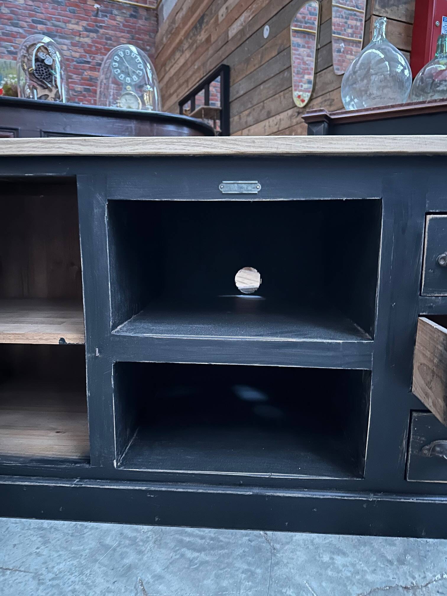 Workshop furniture transformed into a TV unit.