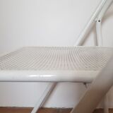 Vintage perforated metal folding chair