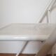 Vintage perforated metal folding chair