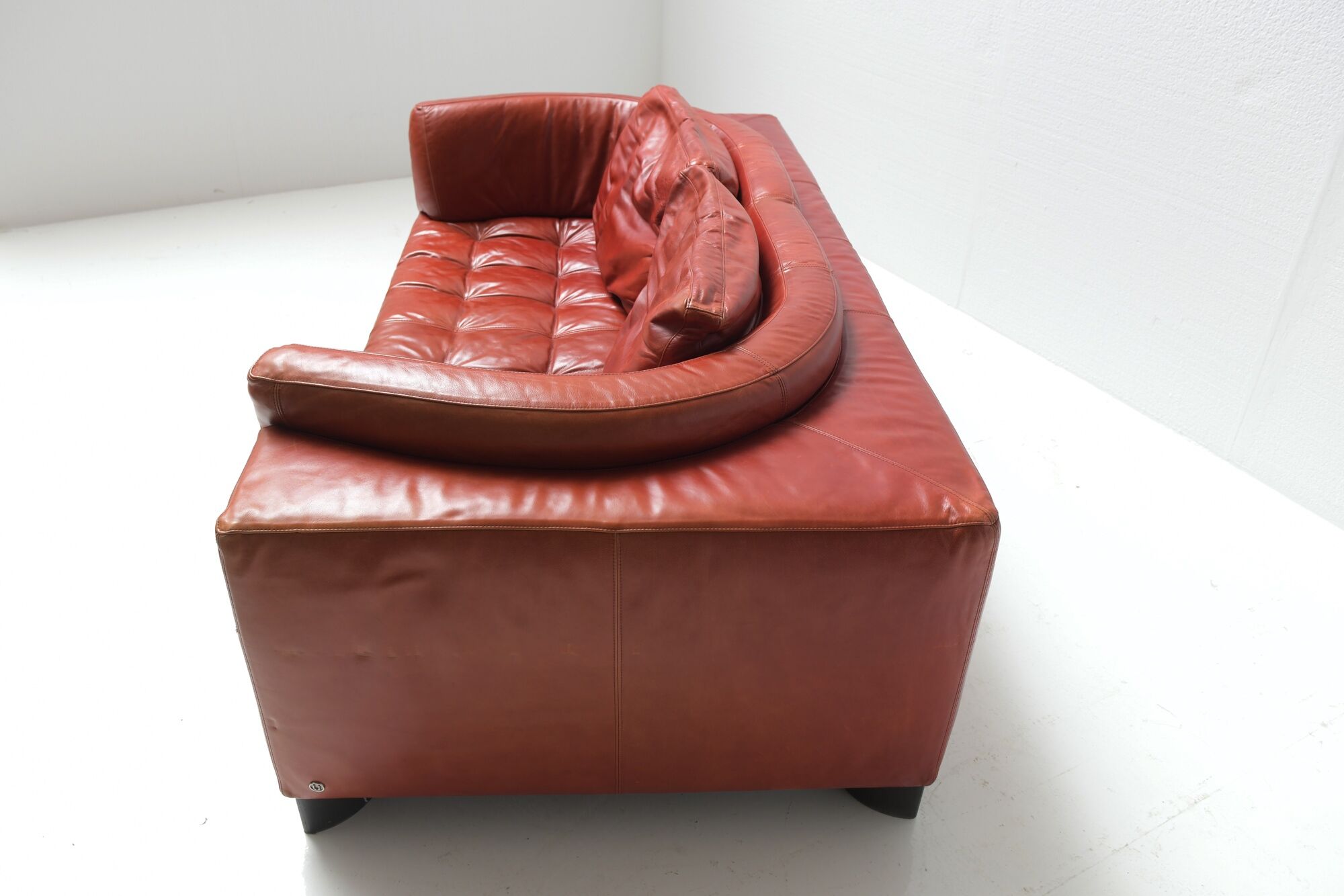 Vintage Osaka loveseat in oxblood leather by Natuzzi Italy