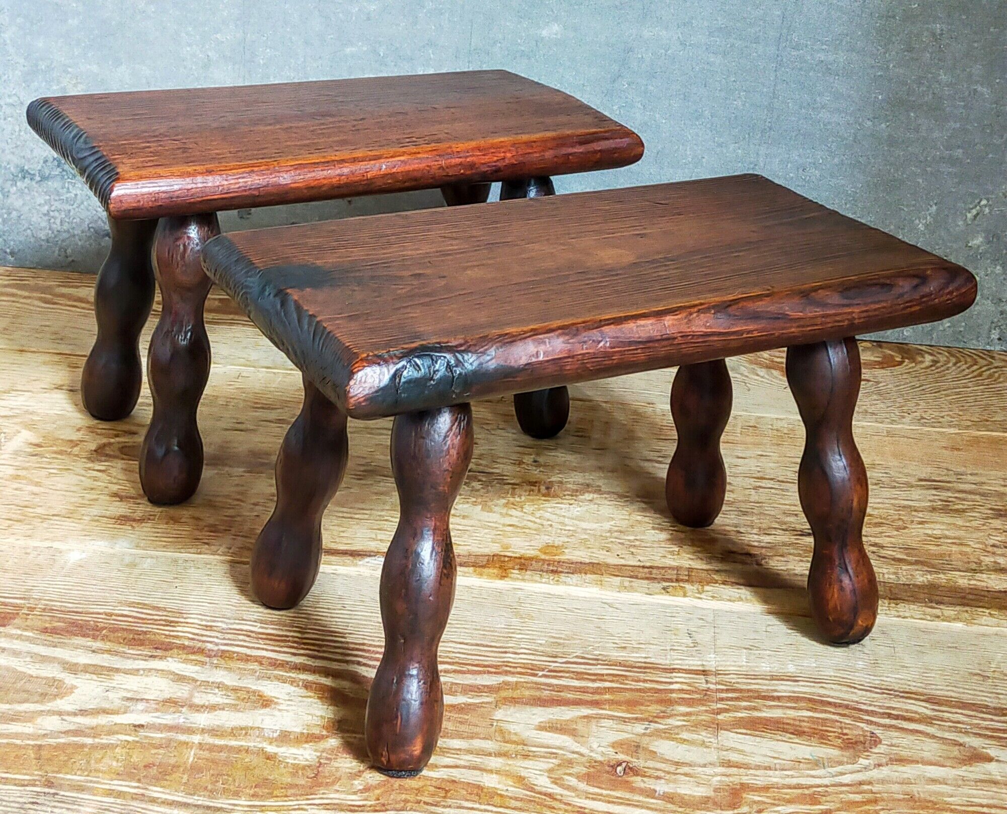 Pair of vintage solid turned wood footstools