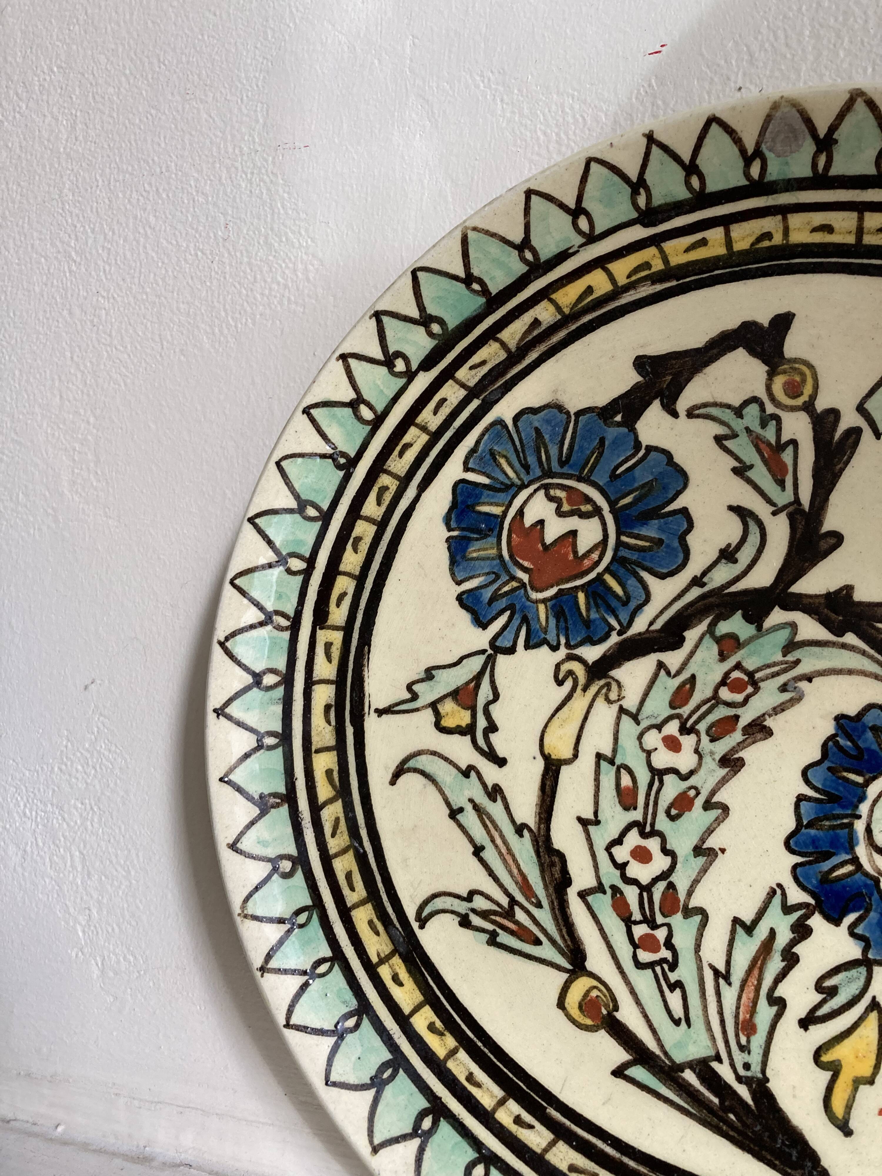 Assiette décorative à décor de fleurs vert