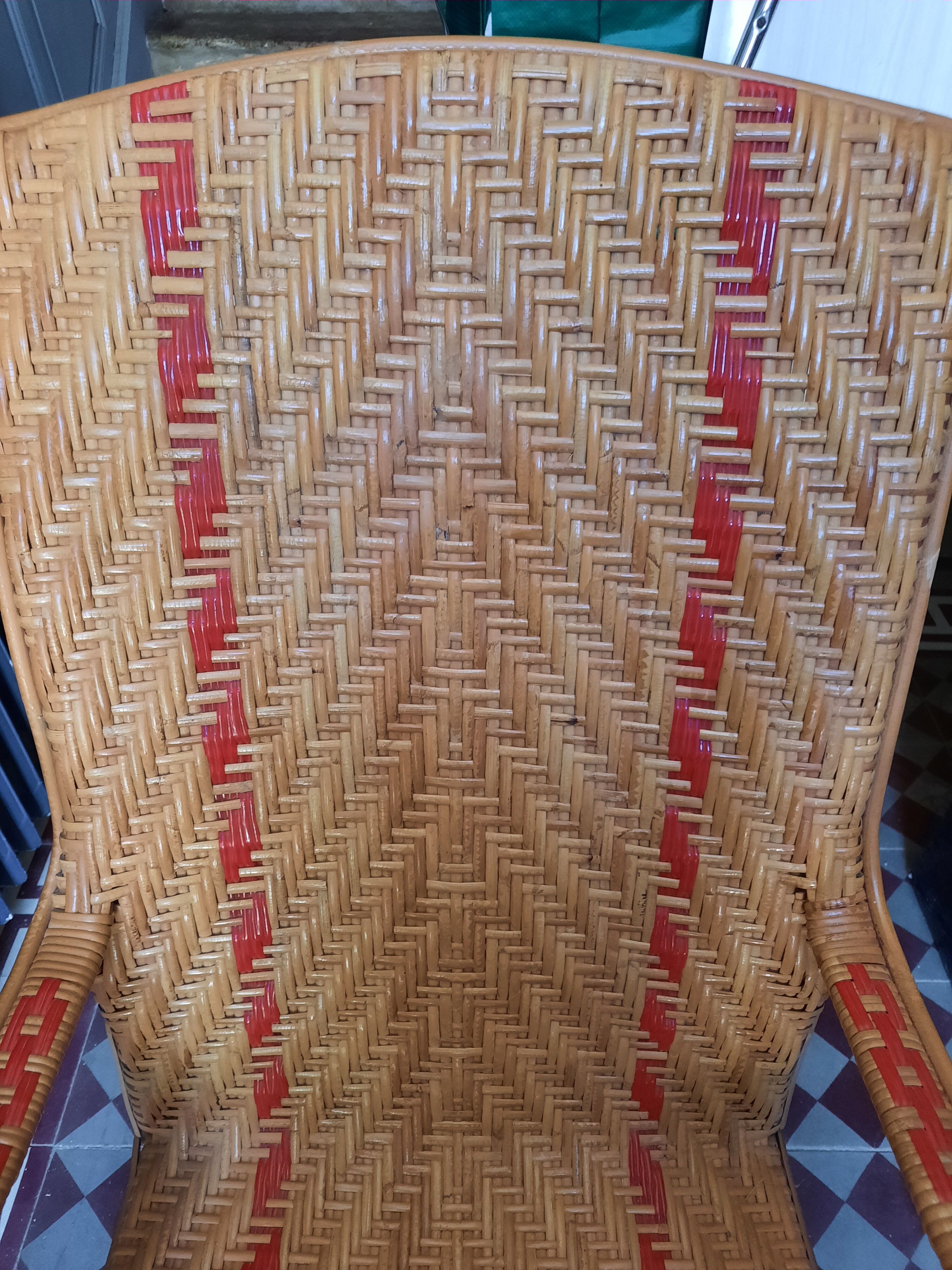 Braided rattan armchair