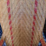 Braided rattan armchair