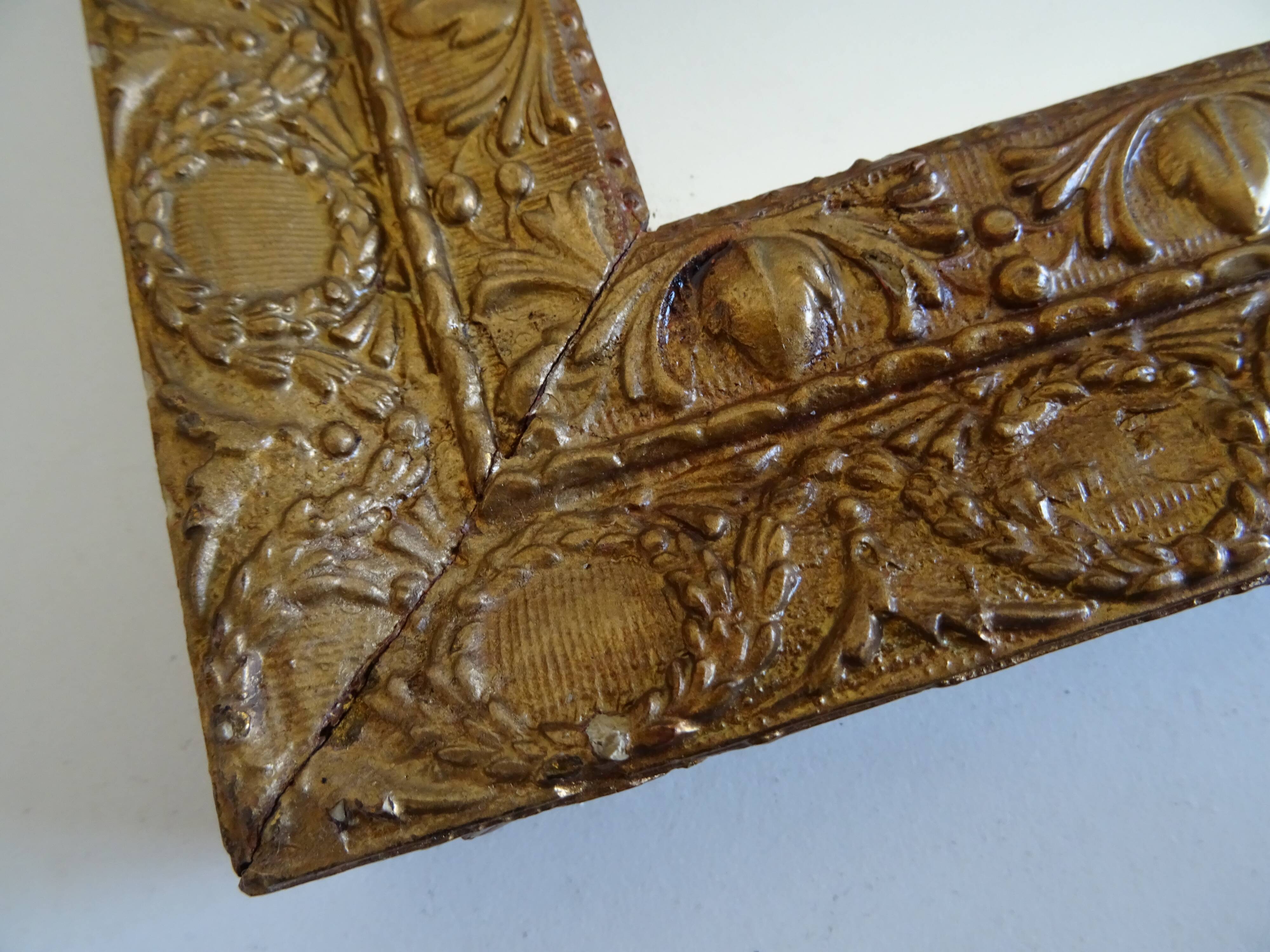 Wood and gilded stucco wall mirror