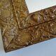 Wood and gilded stucco wall mirror