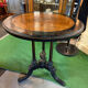 Pedestal table in blackened and fruit wood