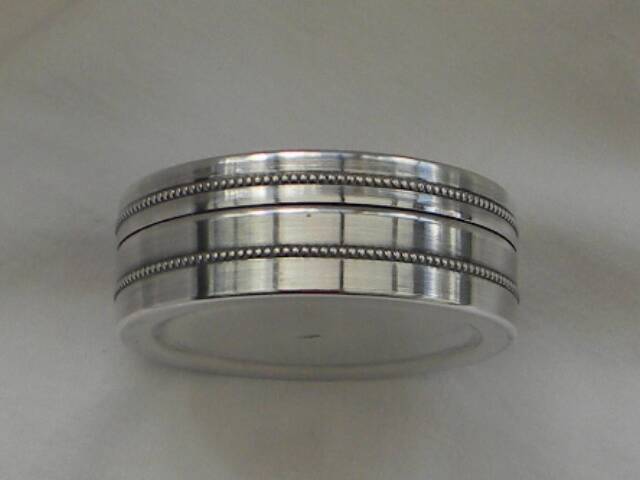 Small round silver metal box SNPA.