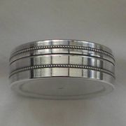Small round silver metal box SNPA.