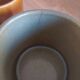 2 vintage khaki ceramic mugs