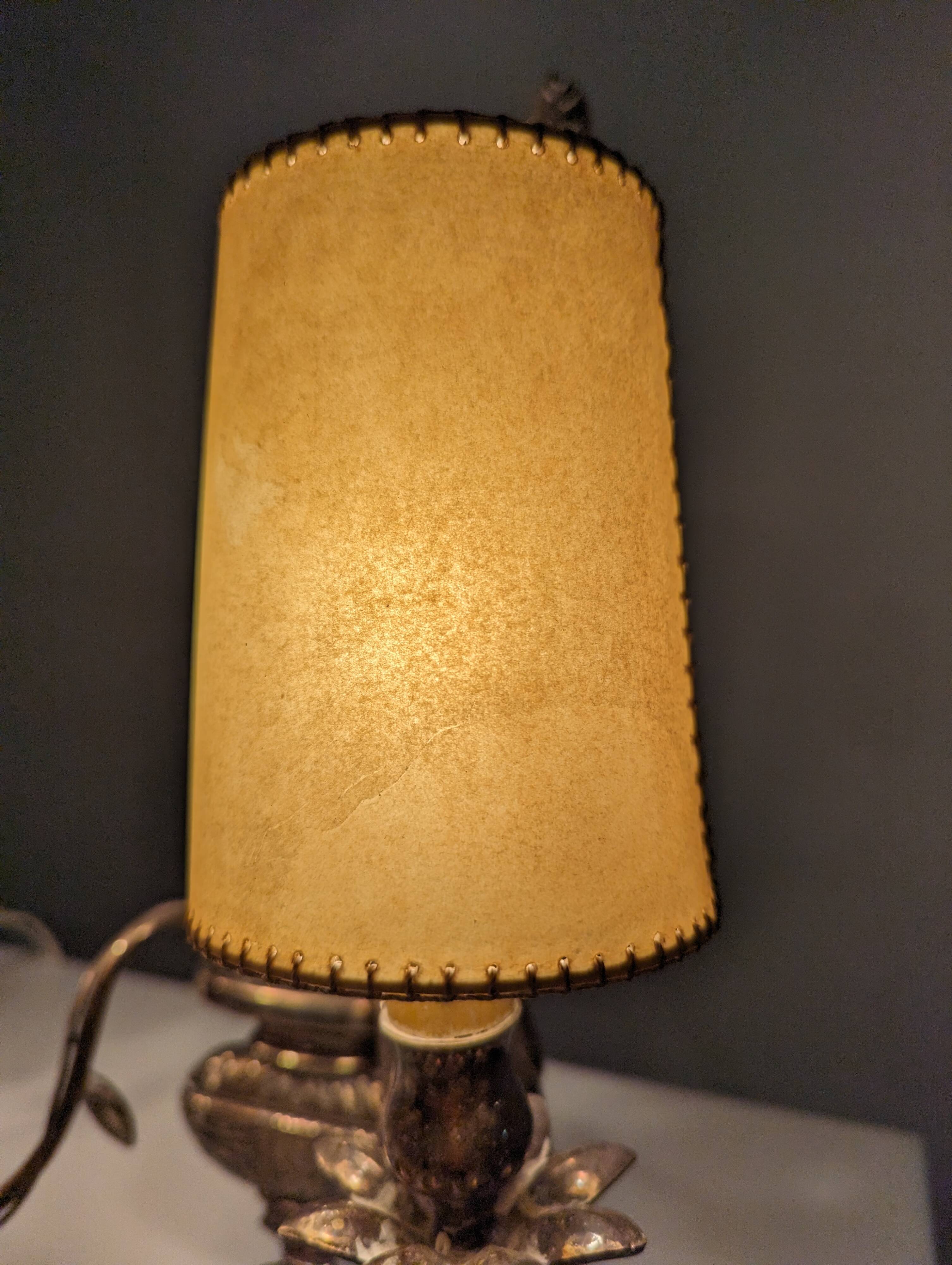 Pair of wall sconces with parrots and leaves