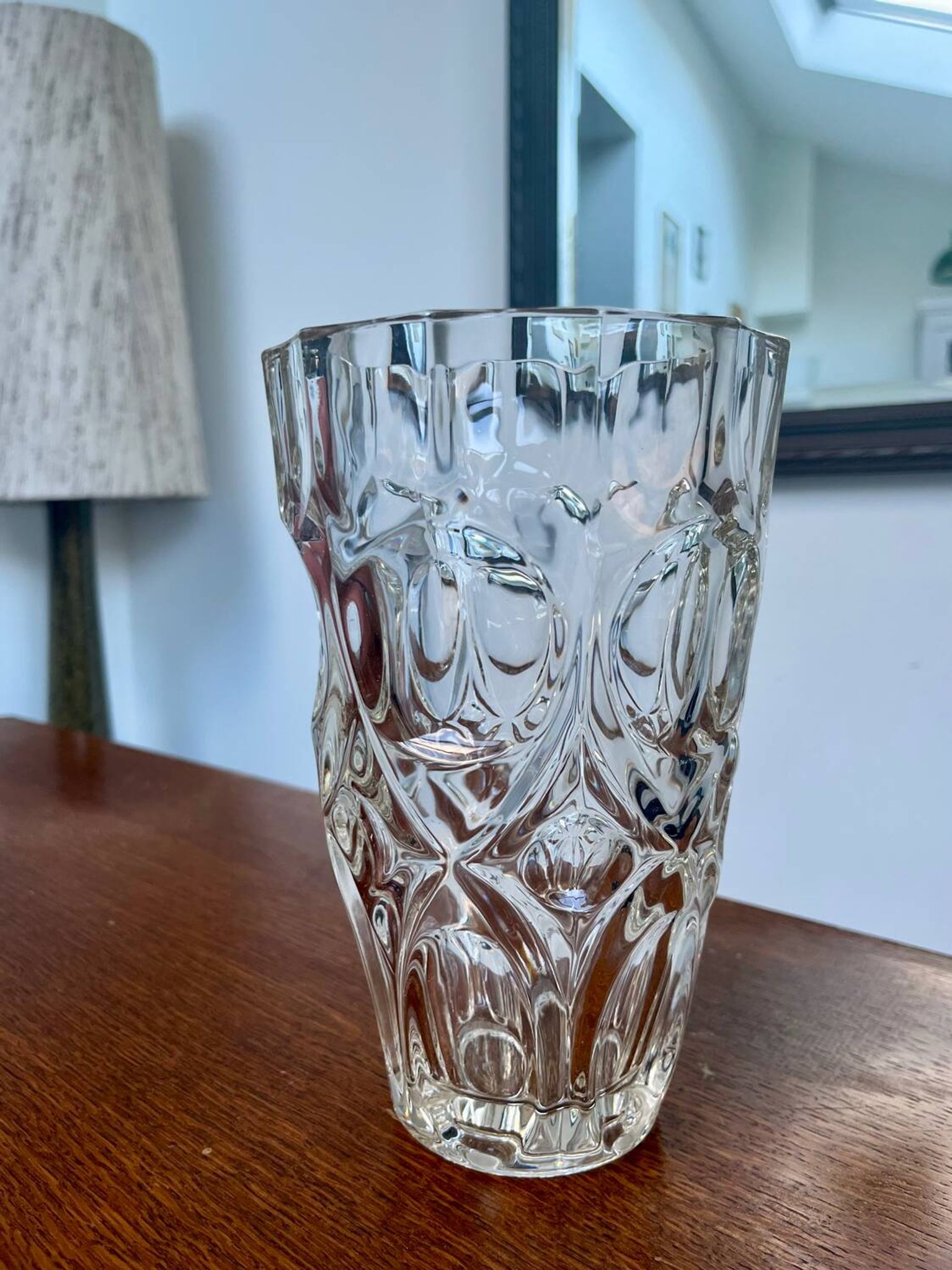 Molded glass vase with sculpted decoration