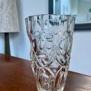 Molded glass vase with sculpted decoration