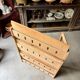 Folding bookshop shelf in light wood