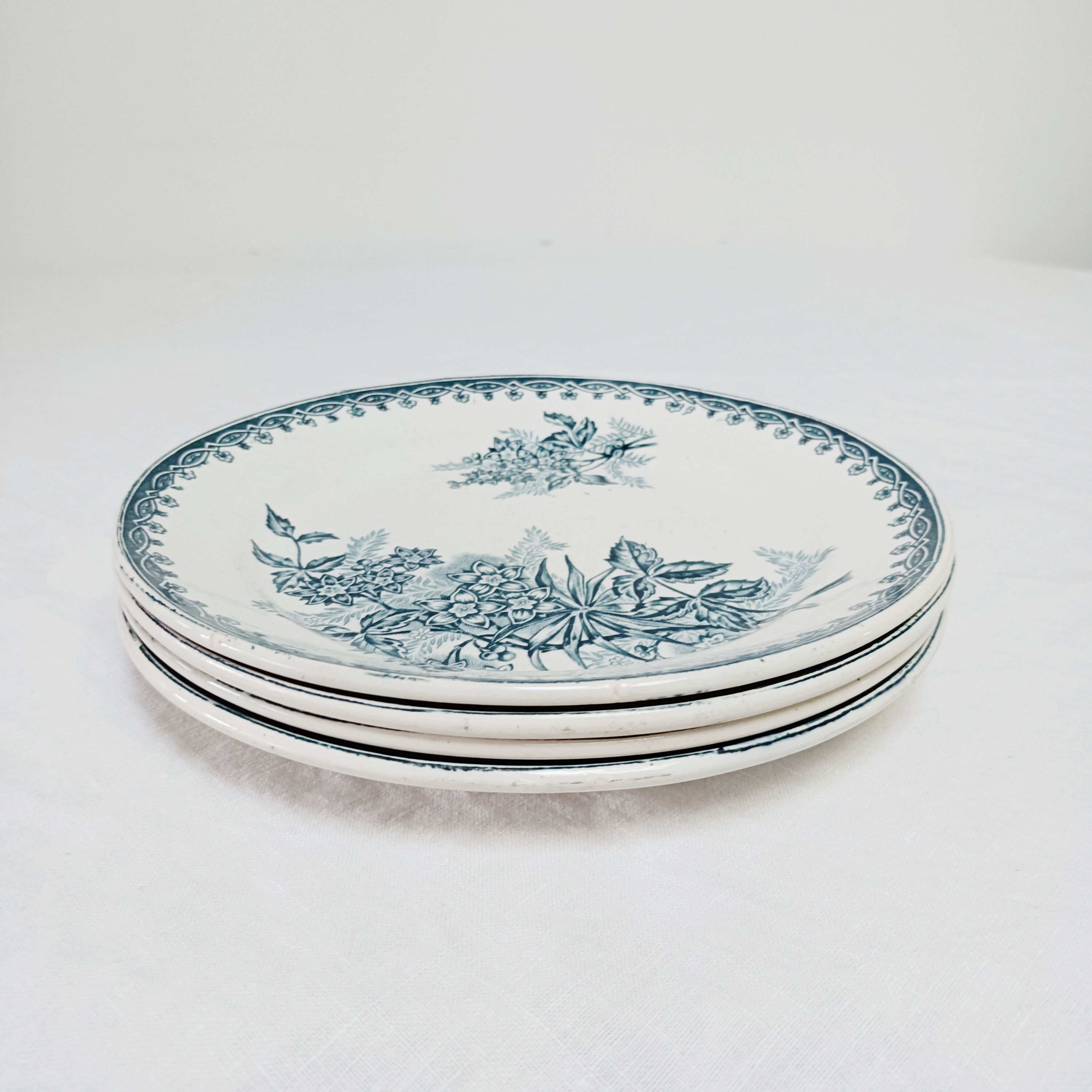 Set of 4 flat plates, iron earth, Société Amandinoise, Margot