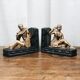 Old book clamps in black & gold plaster