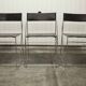 Set of 3 minimalist X line chairs by Niels Jorgen Haugesen.