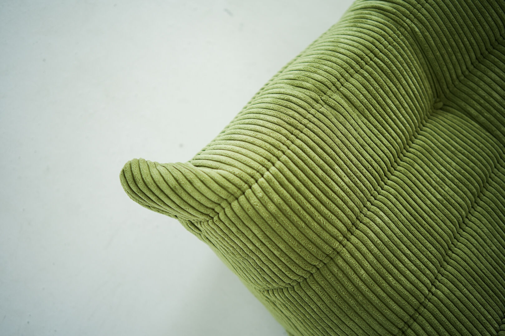 Togo Armchair and Pouf in Fresh green Corduroy