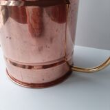Ancient copper watering can