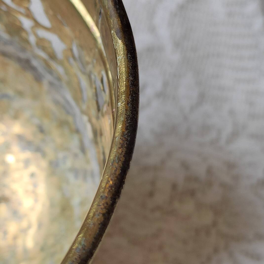 Old golden metal planter