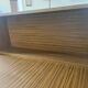 Vintage foldable bedside table in zebra wood – 1970s