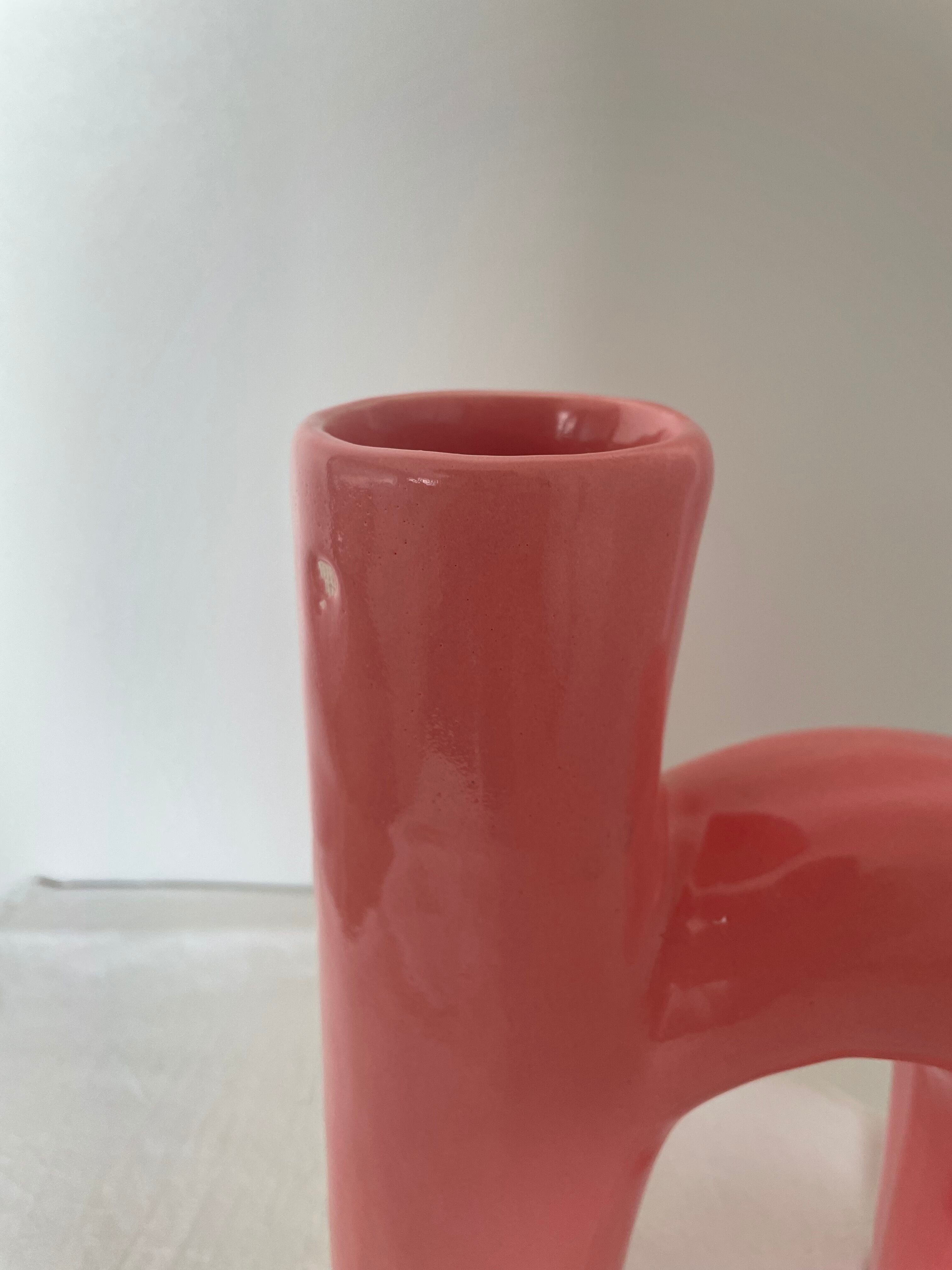 Abstract vase in arched pink ceramic