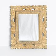Decorative gold mirror mid-century in a wooden frame, Italy, 1960s.