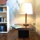 Square pedestal coffee table with mirror top